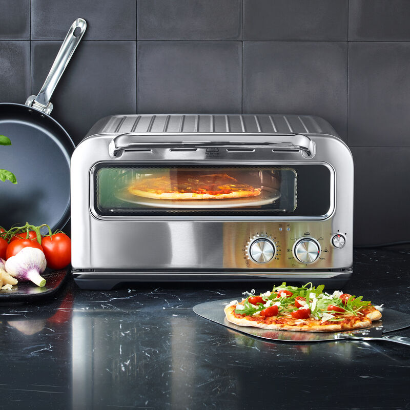 Im modernen 400 °C Edelstahlofen authentische Steinofen Pizza selber backen Bild 2