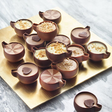 Produktbild fr 'Exquisite Pralinenmischung: Schokoladen-Kaffeetassen in 4 kstlichen Sorten'