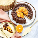 Mallorquinischer Orangen-Cheesecake mit karamellisierten Orangen und Kakaoboden