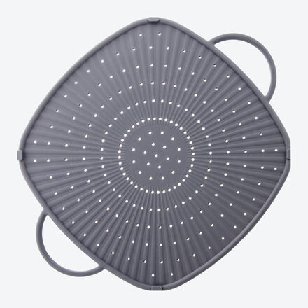 Produktbild fr '3-in-1-Silikon-Spritzschutz - auch als Untersetzer und Backmatte'